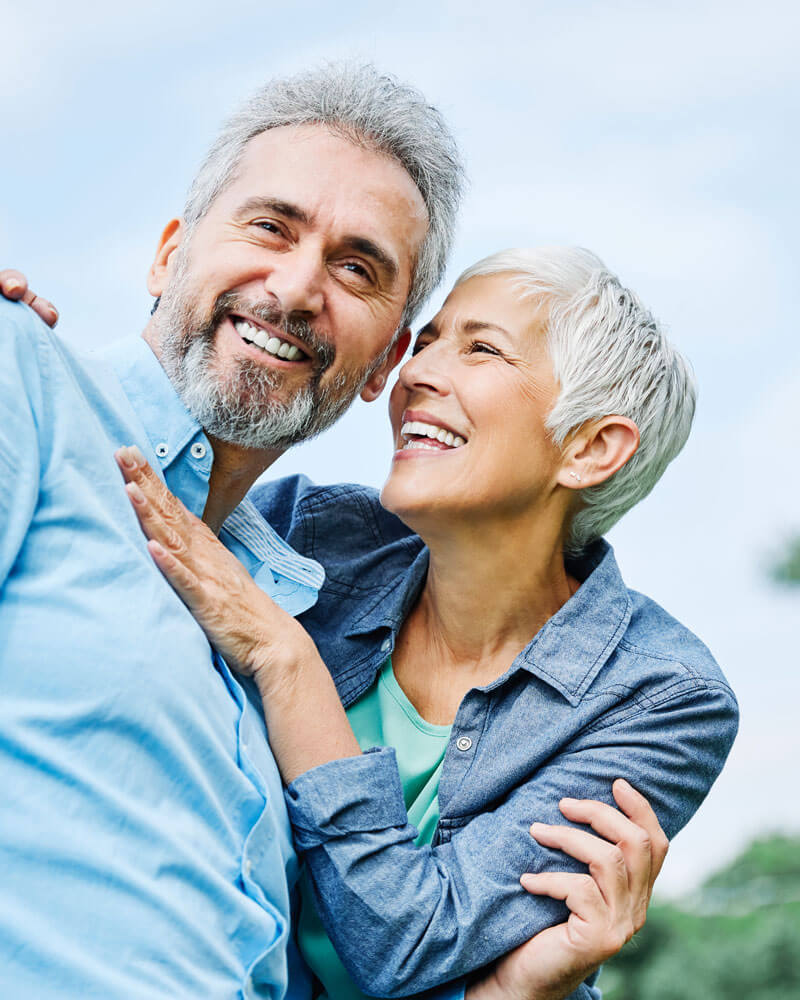 elderly couple smiling