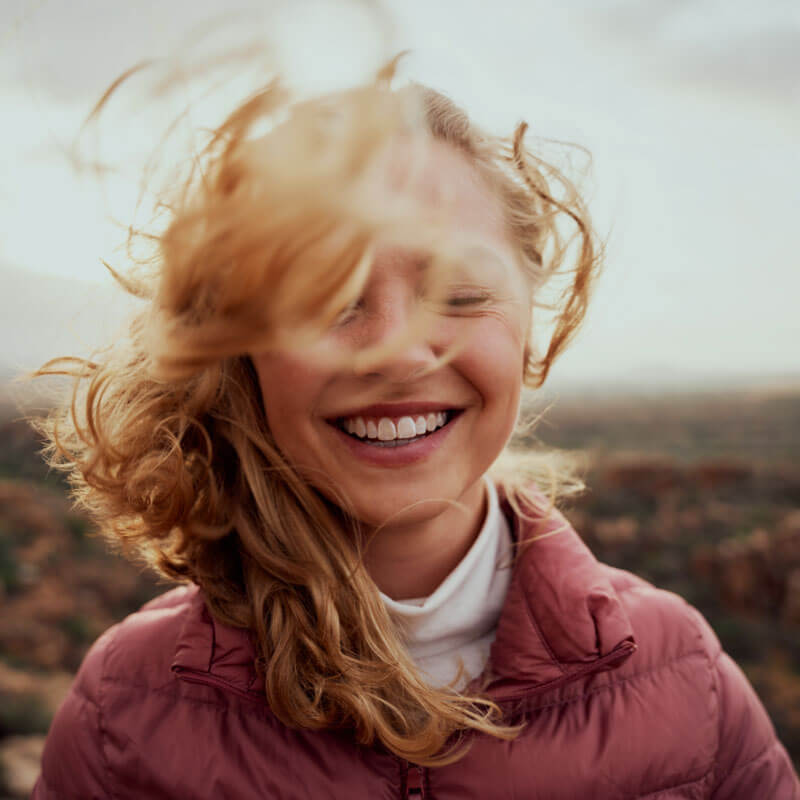 lady in sunlight smiling