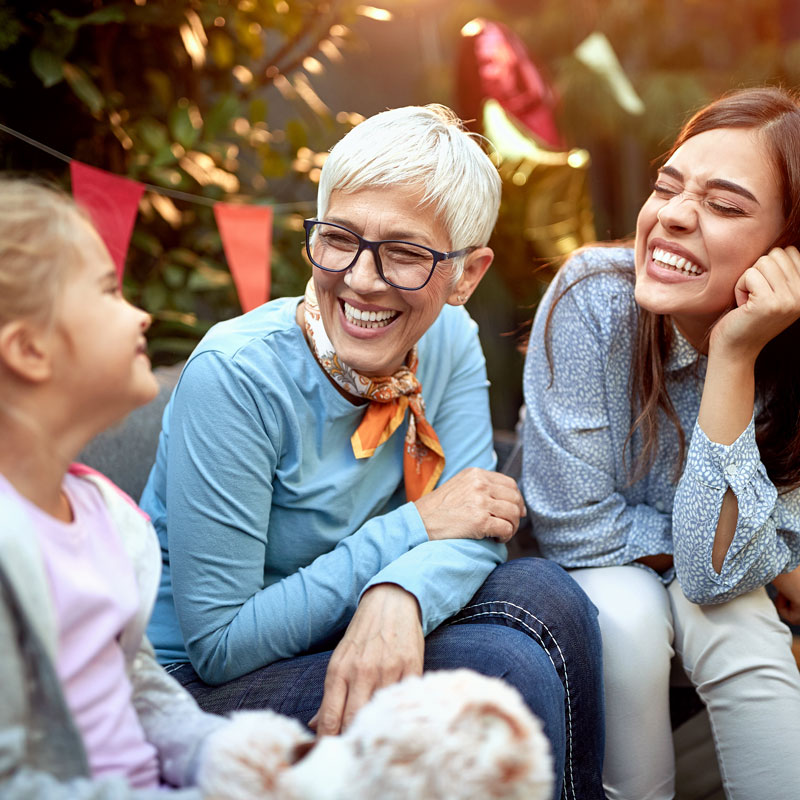 multigenerational smiling family photo